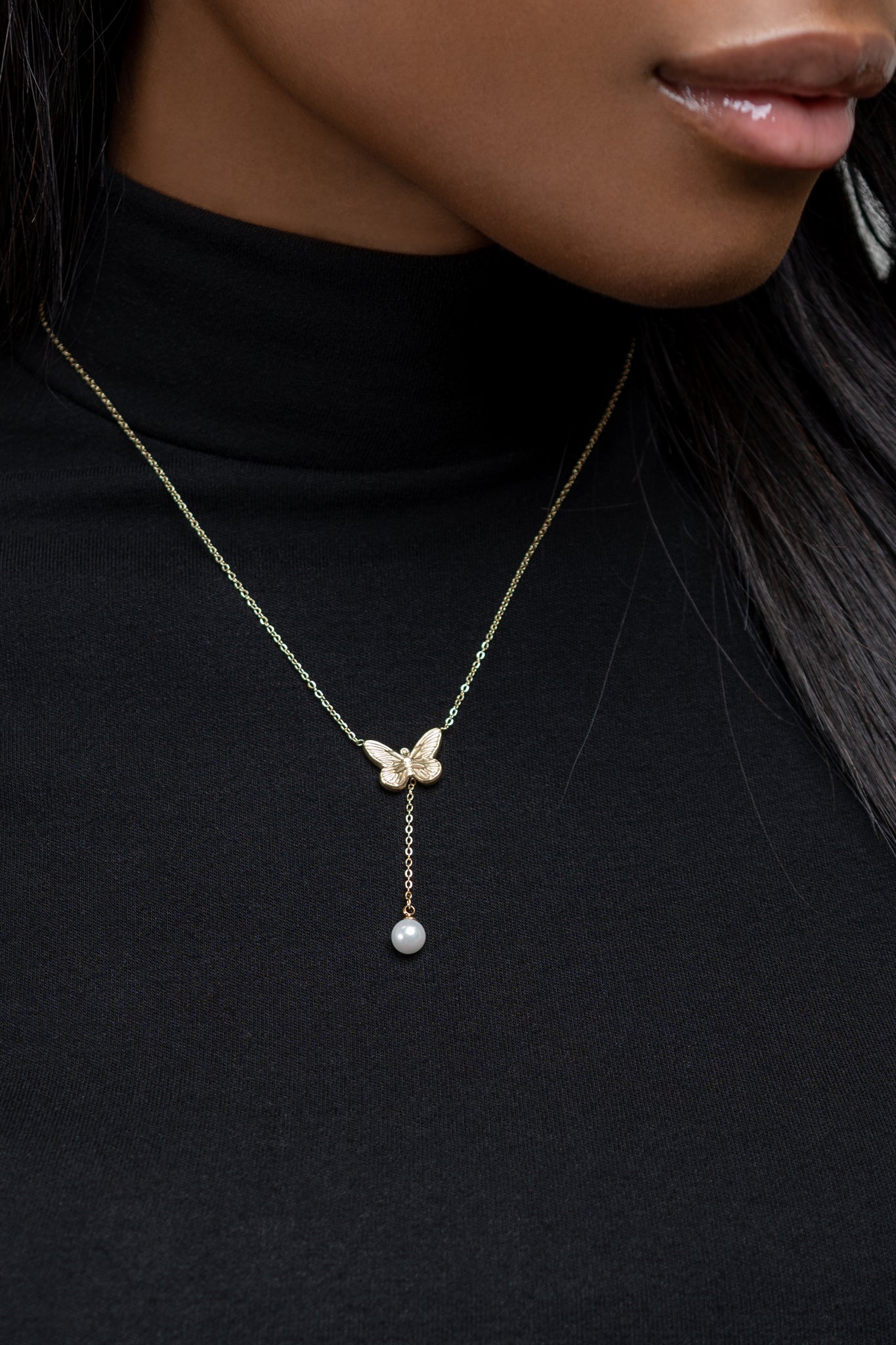 Resilient Butterfly Pearl Drop Necklace